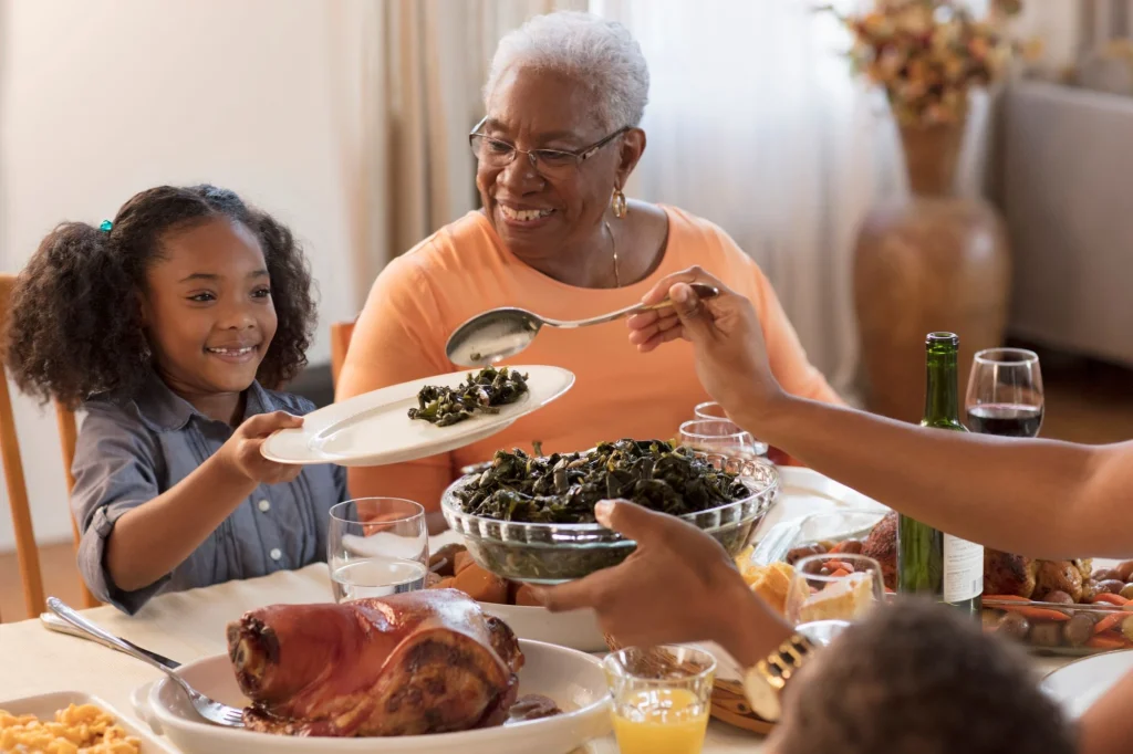 granddaughter and grandma at thanksgiving dinner