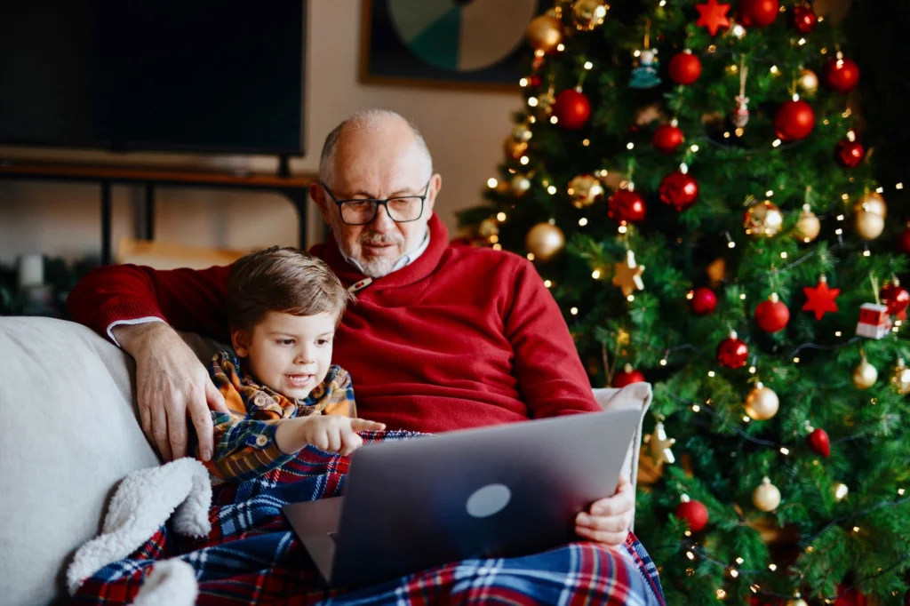 staring at the laptop with granddad 