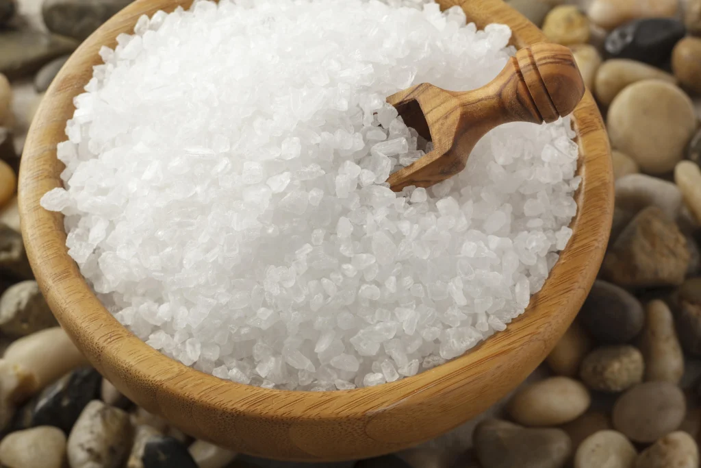 white Epsom Salt in a bowl close up