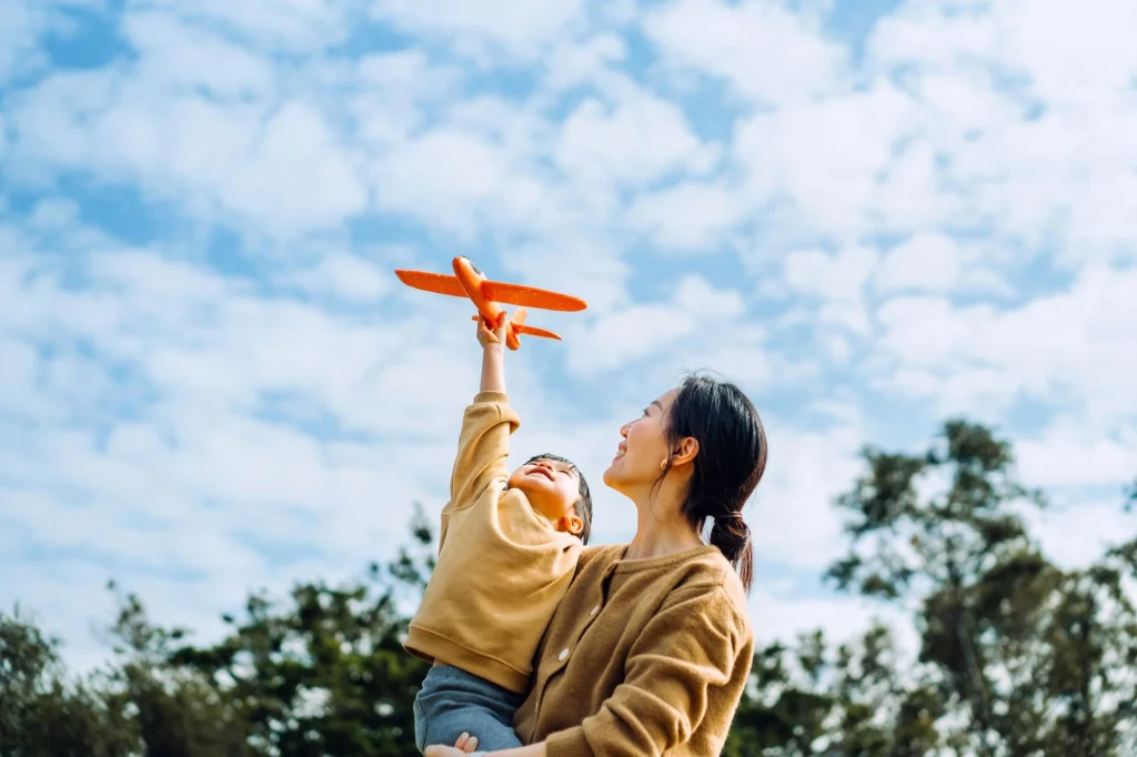 mom and daughter airplane