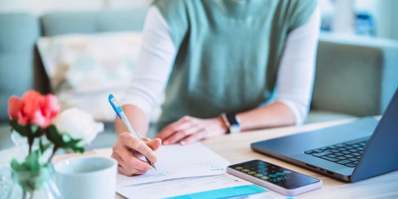senior woman sitting at a desk working