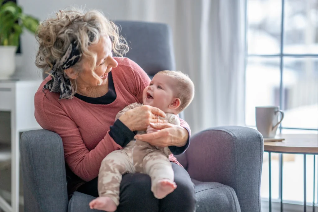 grandma and grandbaby laughing