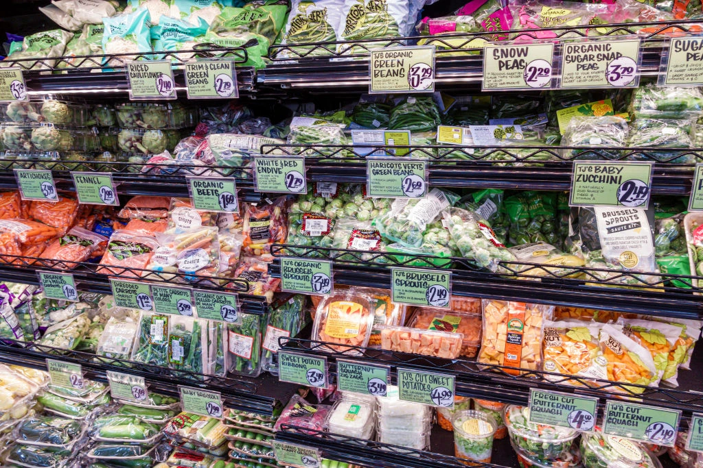 Florida, Miami Beach, Trader Joe's, grocery store, precut brussels sprouts, zucchini, green beans, carrots. (Photo by: Jeff Greenberg/Education Images/Universal Images Group via Getty Images)