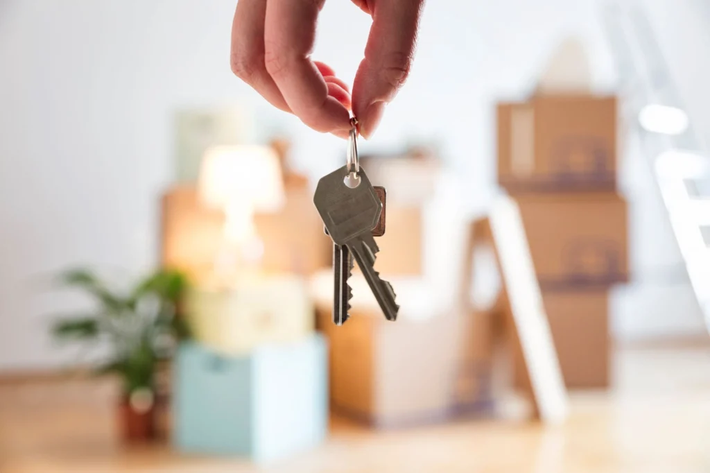 keys dangling from fingertips