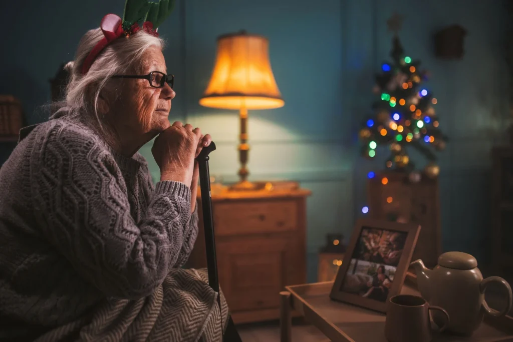 older lady sad and isolated on christmas