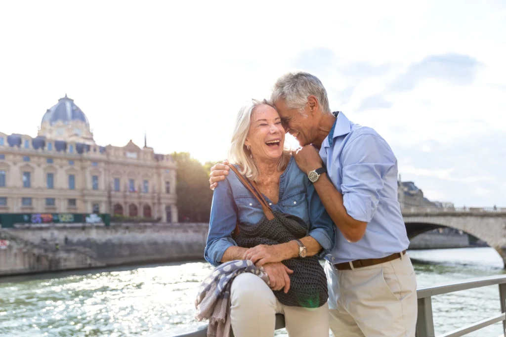 senior couple seine river paris