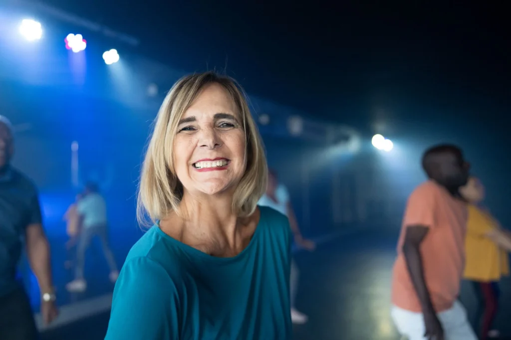 older lady in a senior fitness dance class