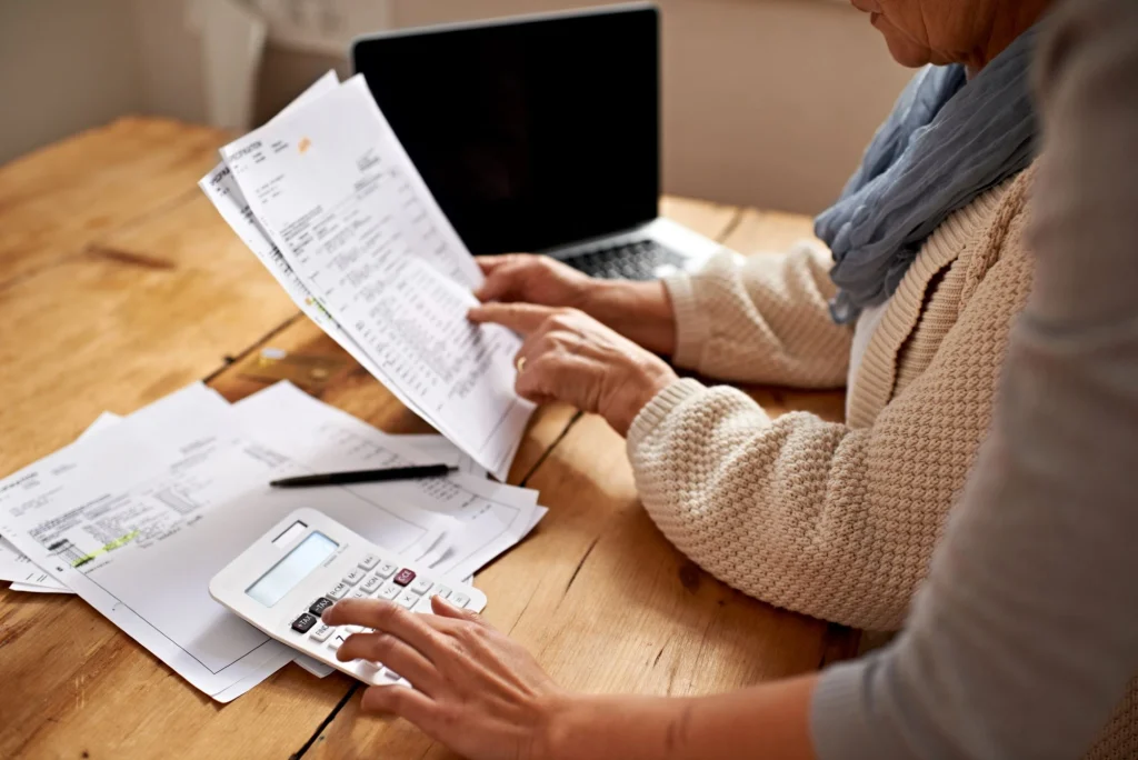 senior woman doing taxes