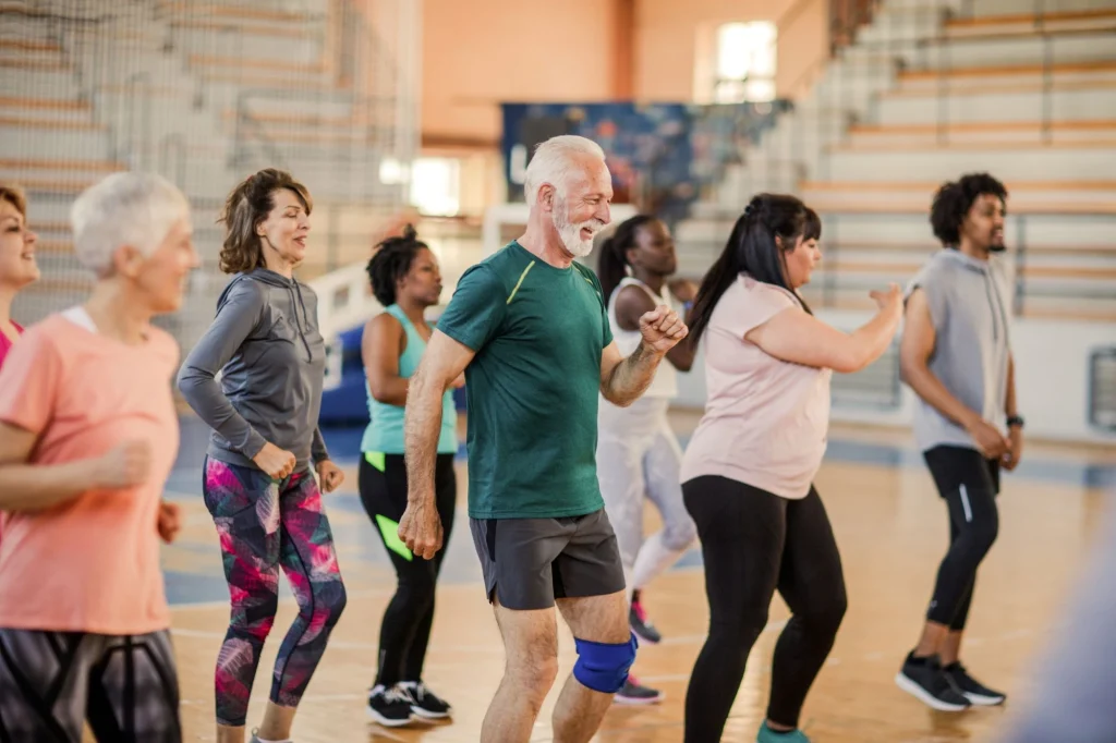 large group of seniors and others at zumba class