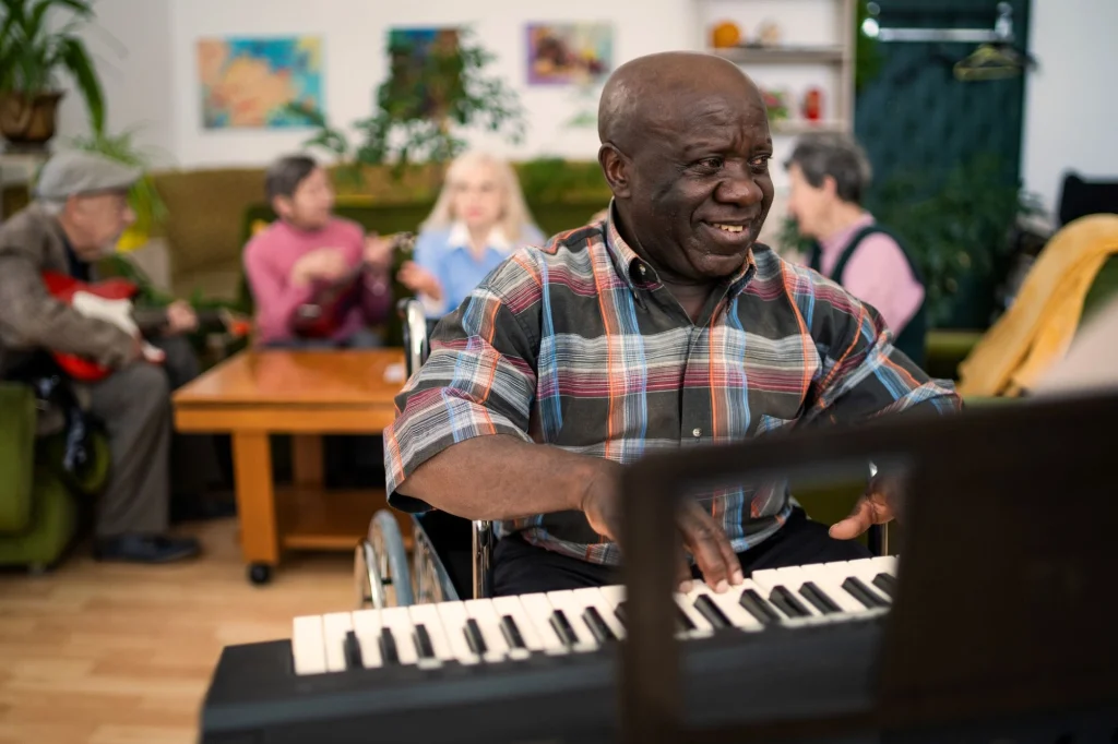 gentleman playing piano at adult day care