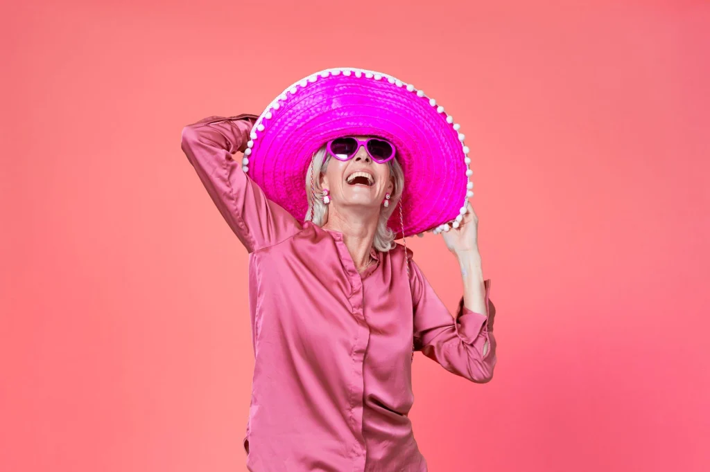 pink hat lady smiling