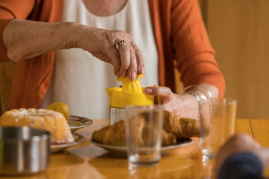 senior lady making lemonade saving money