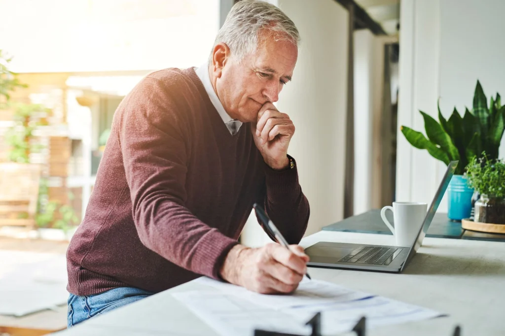 man writing a will