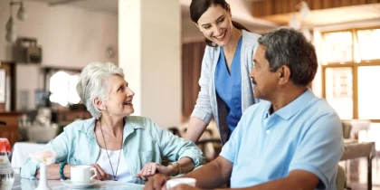nurse checking on residents in assisted living