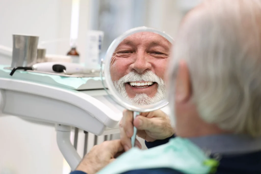 older man in a dentist
