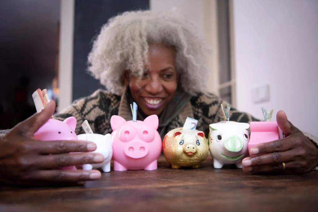 a lady with piggy banks hoarding greed