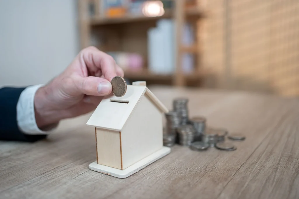 putting coin in slot of home