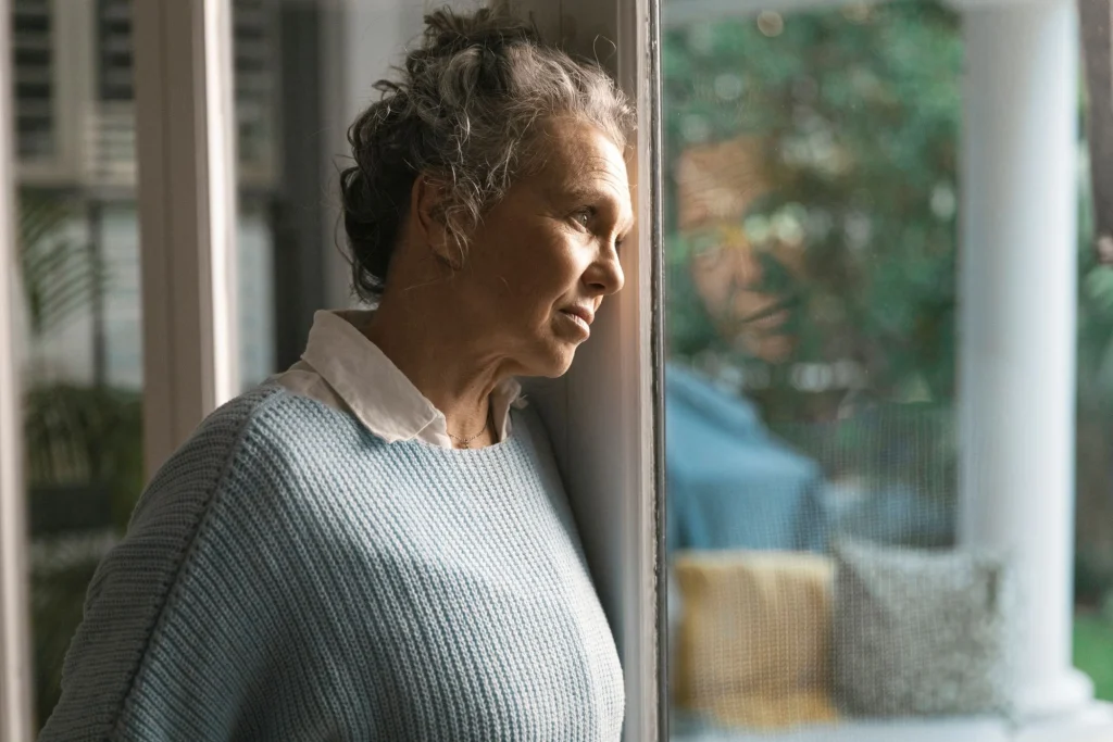 lady staring out the window