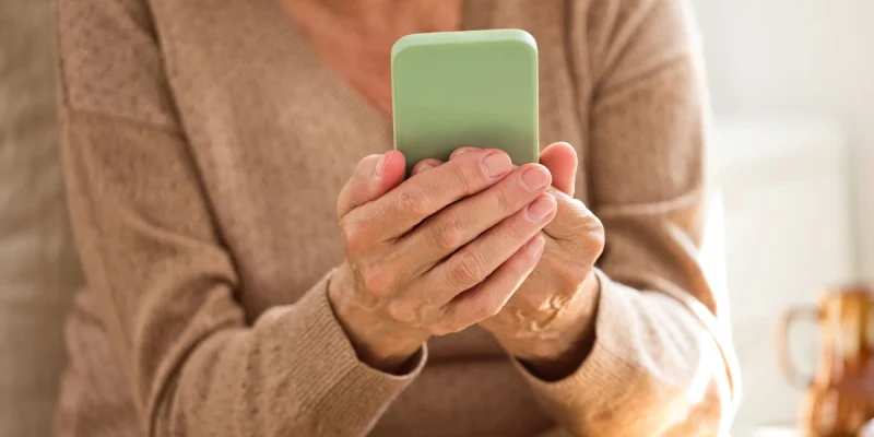 senior using a smart phone