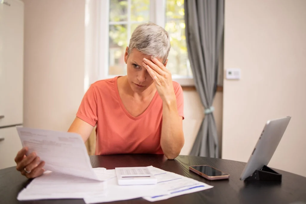 lady staring at paperwork