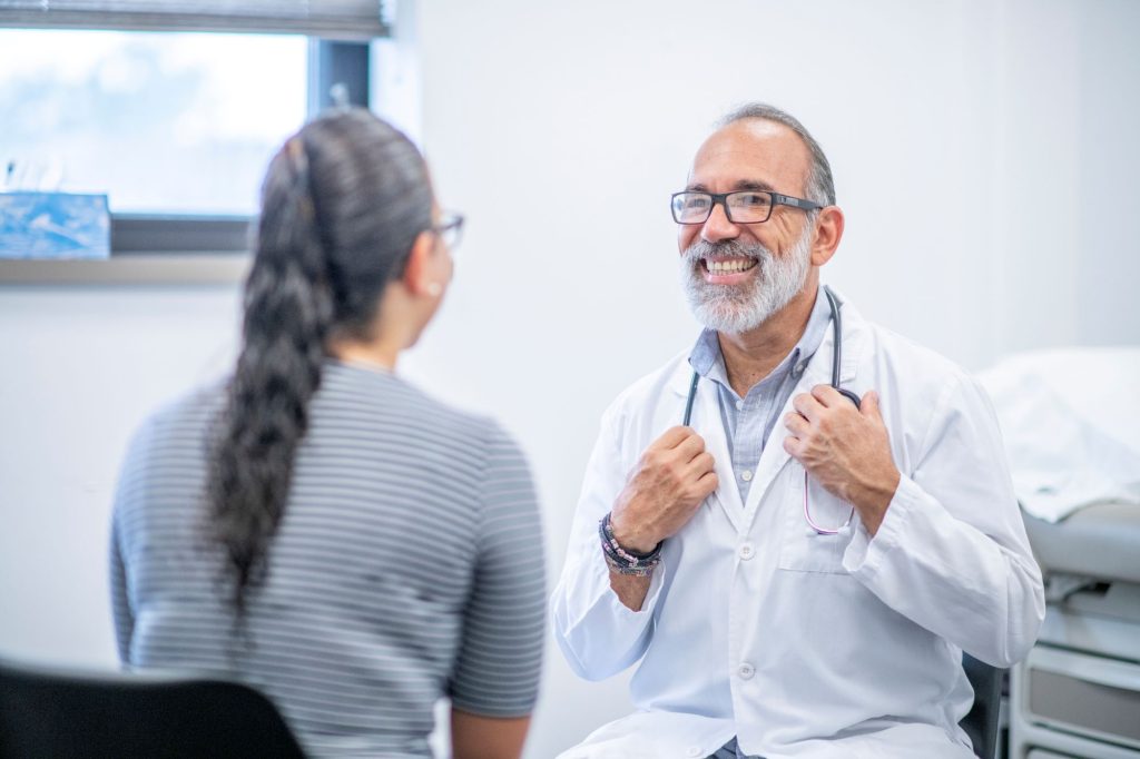 smiling doctor and patient