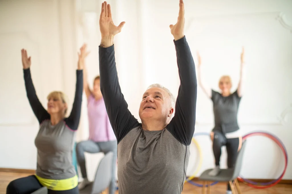 stretching arms toward ceiling exercise and praise