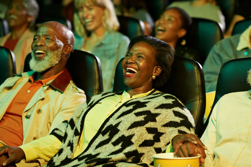 lady and man watching a play