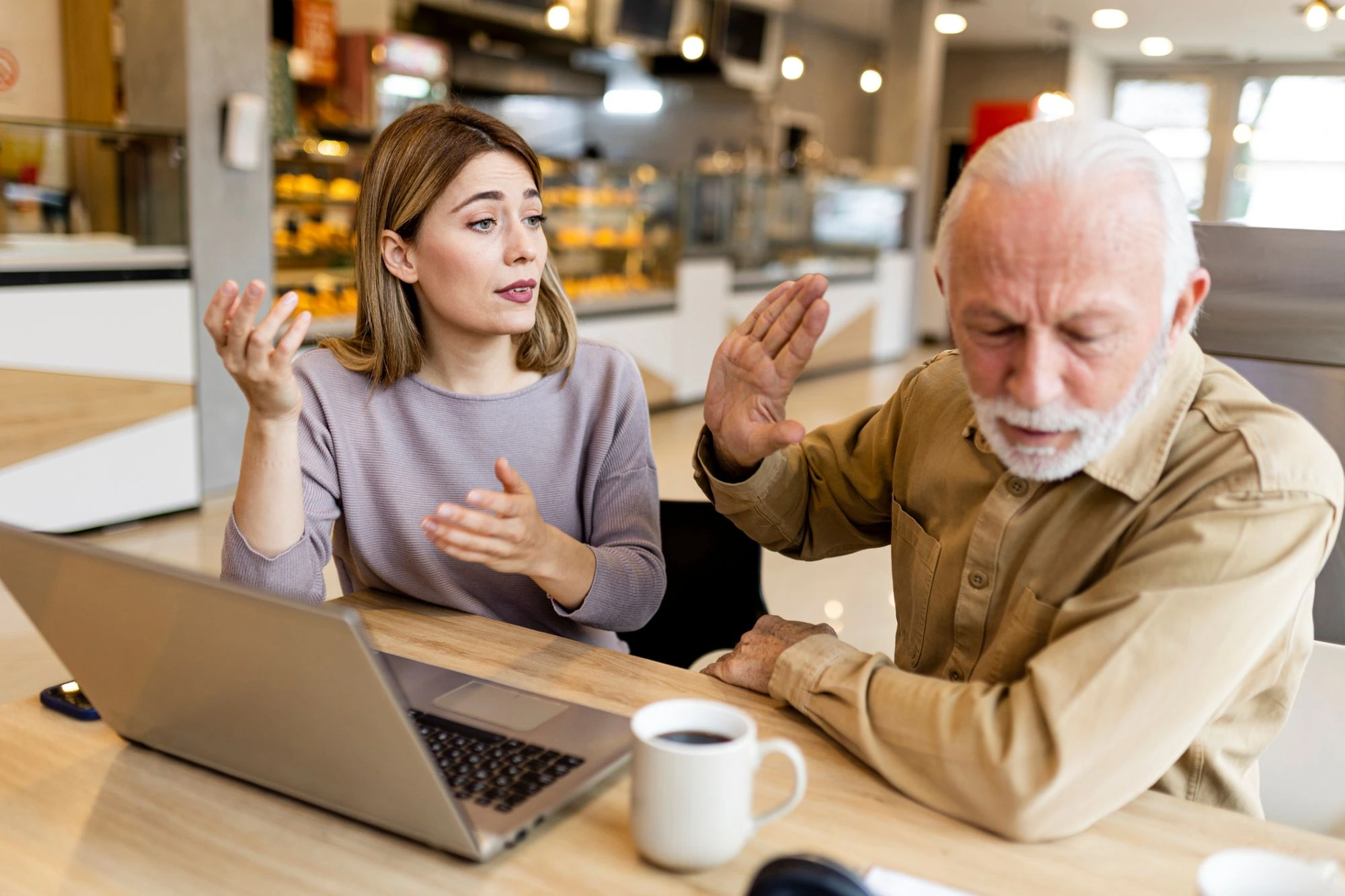 dad and daughter arguing at the table