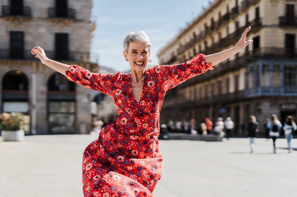 lady running outside with her arms outstretched