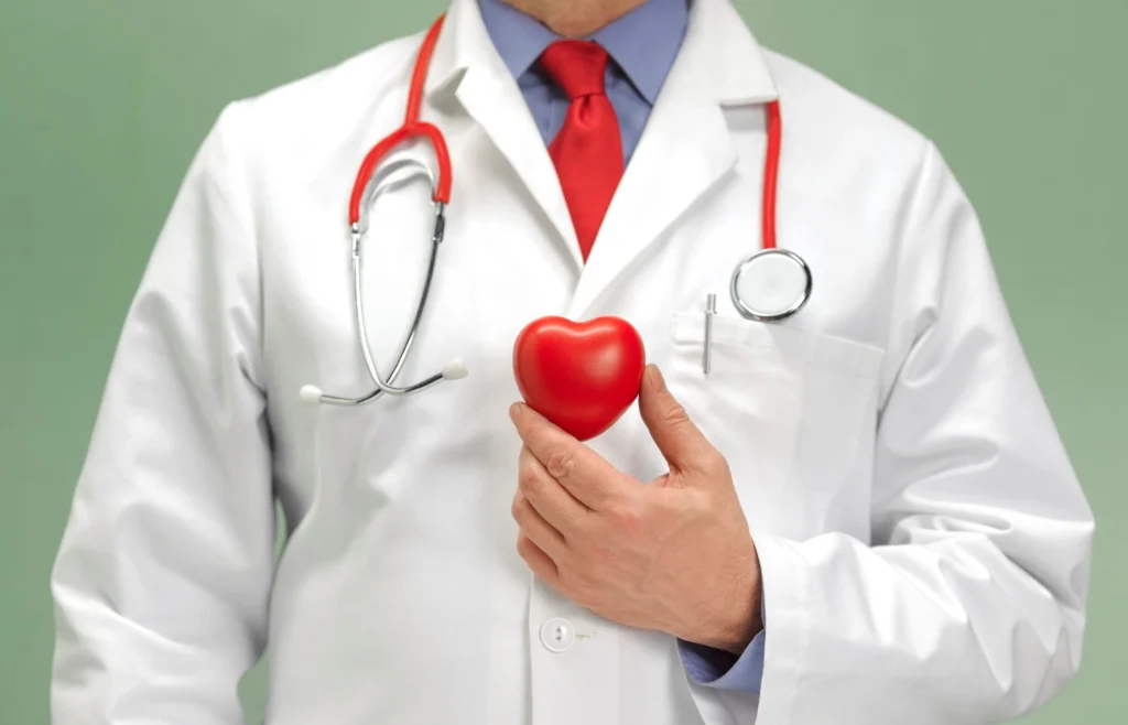 doctor holding a little heart