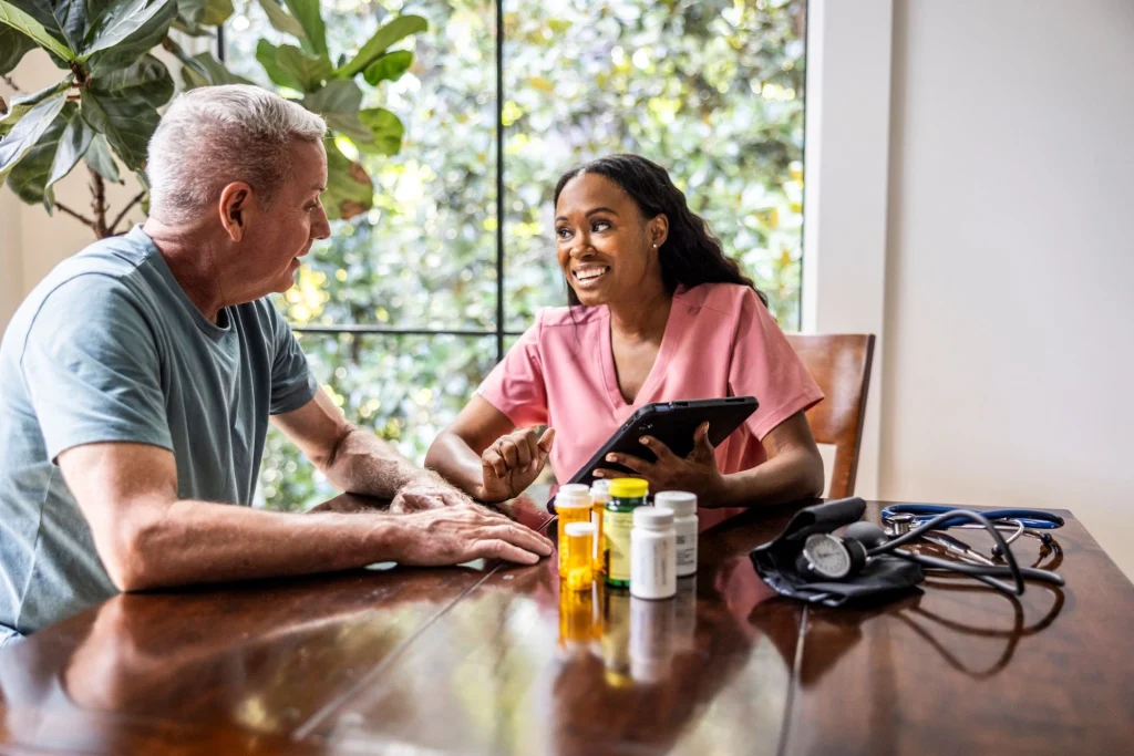 home care nurse and her patient medication management - senior care in cleveland