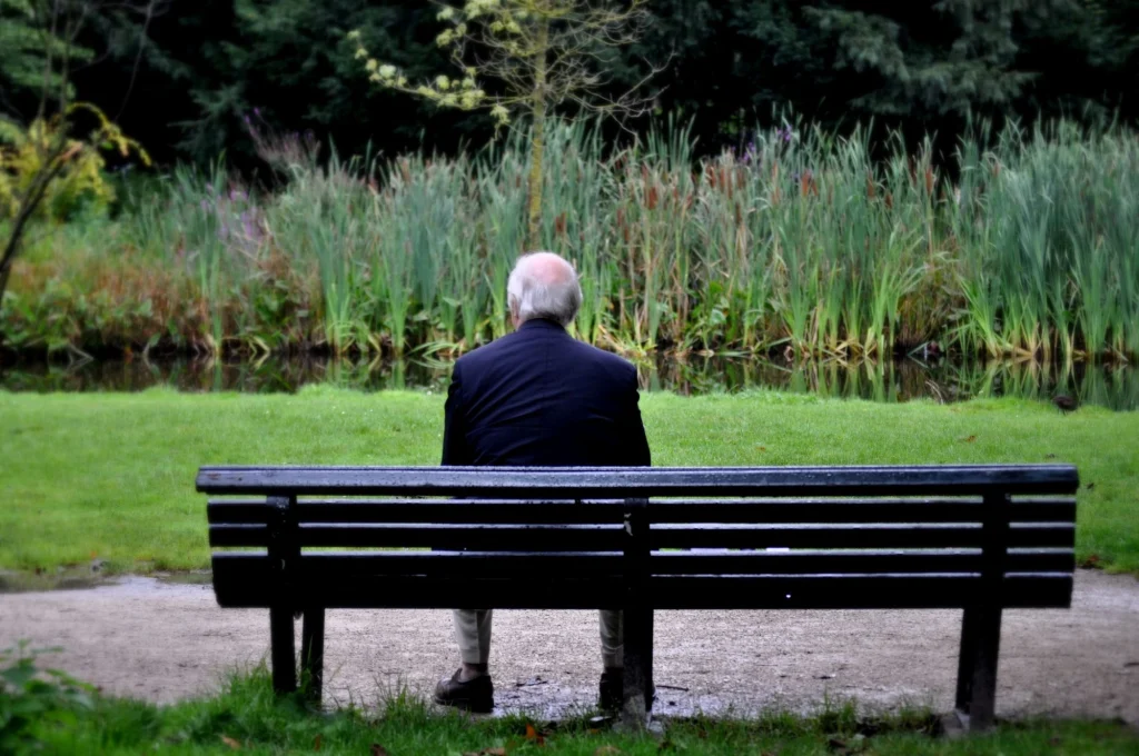 older man sitting on the bench
