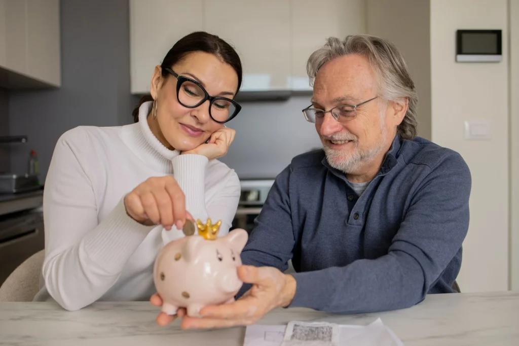 putting money in piggy bank