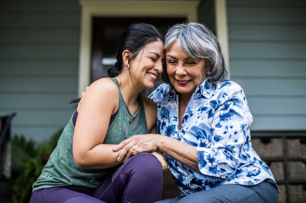 mom and daughter on front porch