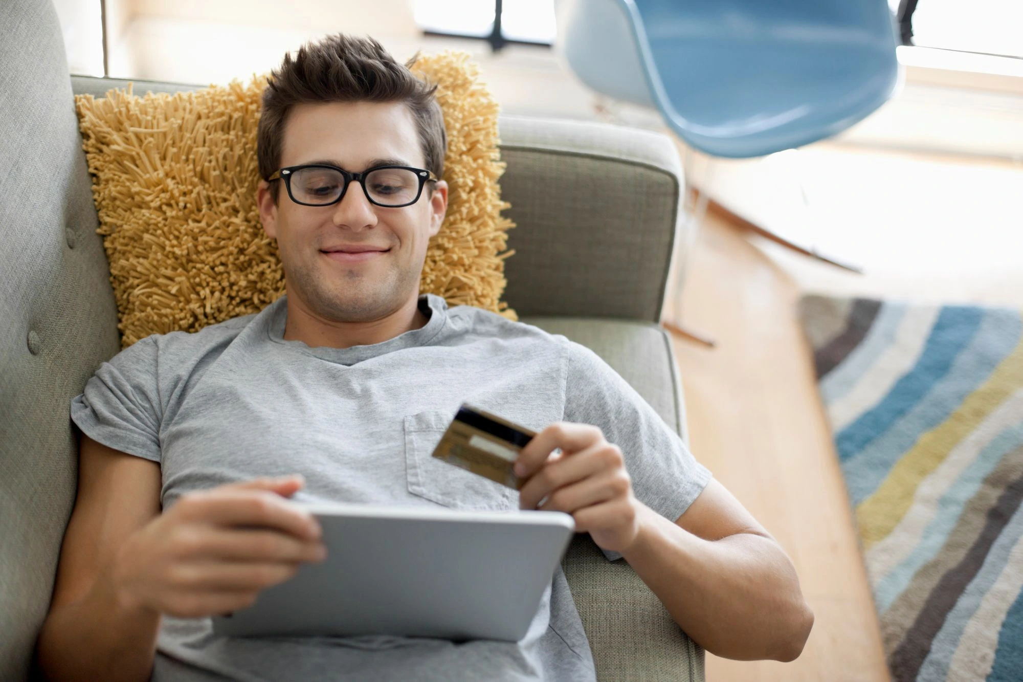 young man shopping credit card