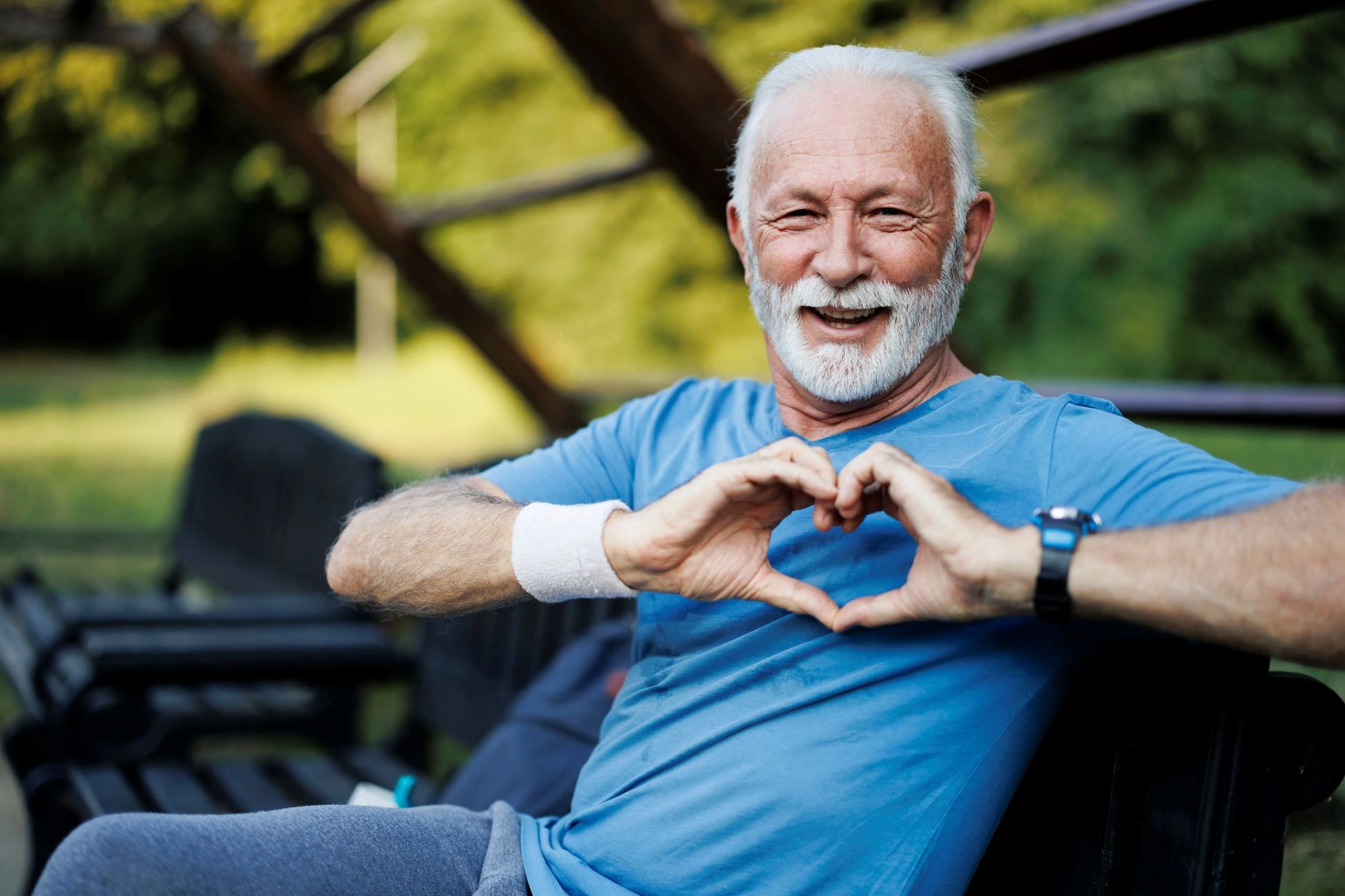 older man heart hands